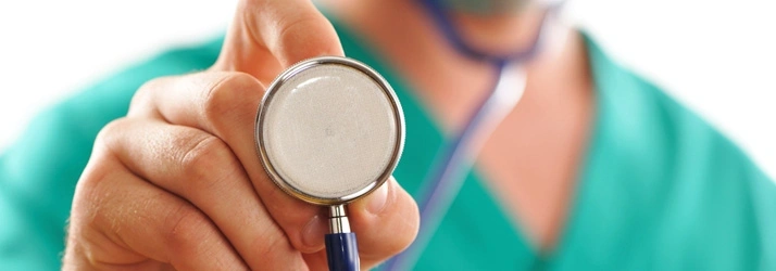 An image of a healthcare professional holding a stethoscope